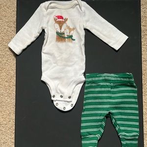 A nice Christmas outfit for a newborn baby colors are green, white and brown